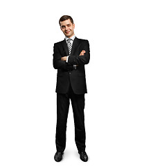 Image showing full length male in suit with folded hands