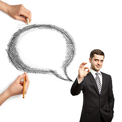 Image showing human hands with speech bubble and man