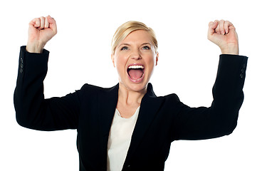 Image showing Corporate lady shouting with arms up