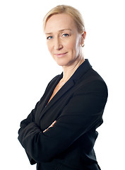 Image showing Closeup shot of a senior businesswoman posing with folded arms