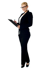 Image showing Businesswoman with a clipboard