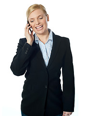 Image showing Corporate female communicating on phone