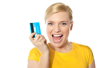 Image showing Blond sales girl posing with credit card