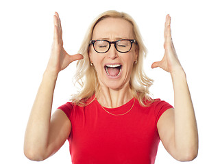 Image showing Frustrated aged woman shouting