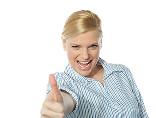 Image showing Successful businesswoman showing thumbs-up