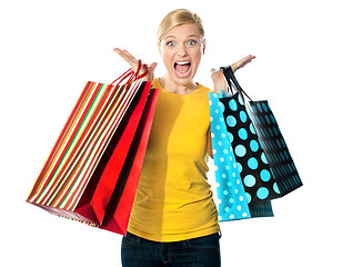 Image showing Young woman excited after tons of shopping