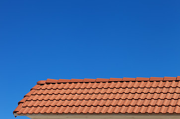 Image showing Roof tiles and blue clear sky