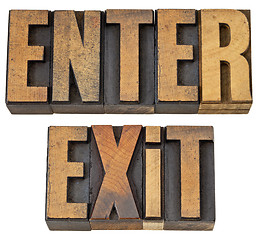 Image showing enter and exit words in wood type