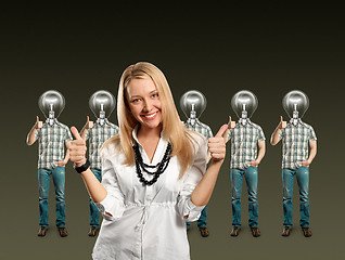 Image showing woman and lamp head businesspeople with laptop