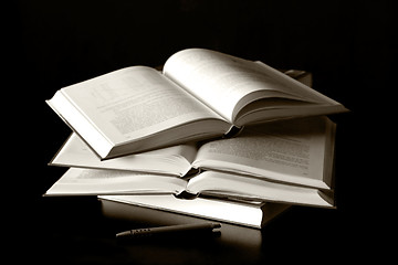 Image showing books on black background