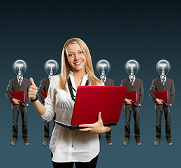 Image showing woman and lamp head businesspeople with laptop