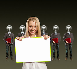 Image showing woman and lamp head businesspeople with laptop