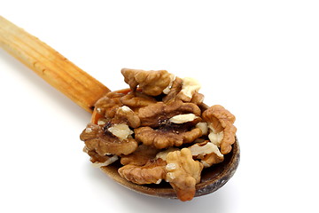 Image showing wooden spoon with walnuts