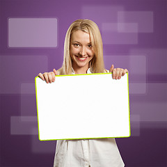 Image showing happy businesswoman holding blank white card