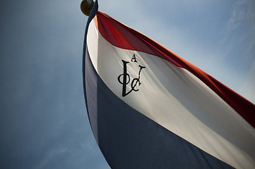 Image showing Dutch VOC flag against sun