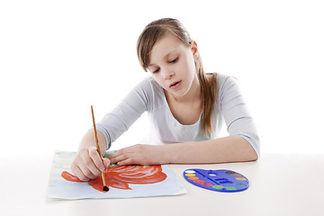 Image showing Girl drawing color flower