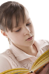 Image showing Portrait of a girl reading