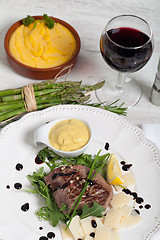 Image showing Beef on arugula salad and parmesan