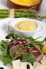 Image showing Beef on arugula salad and parmesan