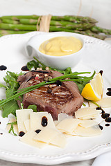 Image showing Beef on arugula salad and parmesan