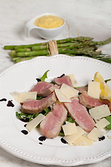 Image showing Beef on arugula salad and parmesan