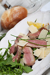 Image showing Beef on arugula salad and parmesan