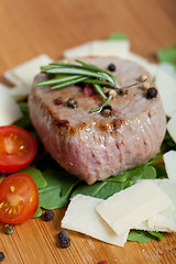 Image showing Cooked Beef on arugula and parmesan