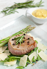 Image showing Delicious Beef on arugula salad and parmesan