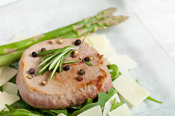 Image showing Delicious Beef on arugula salad and parmesan