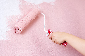 Image showing painting a wall in pink