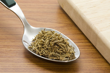 Image showing Spoonful of cumin seeds