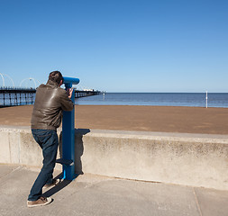 Image showing Senior man looking out over beach at Southport