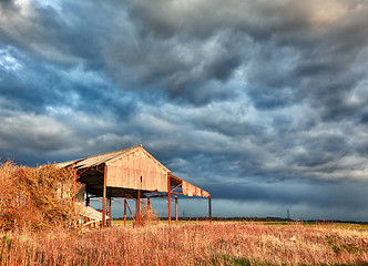 Image showing Deserted barn in storm