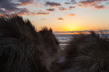 Image showing Sunset over Formby Beach through dunes