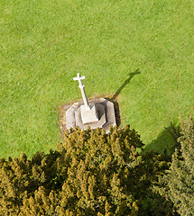 Image showing Carved cross from tower of Ludlow parish church