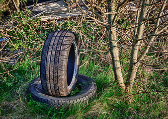 Image showing Abandoned car tires on dump