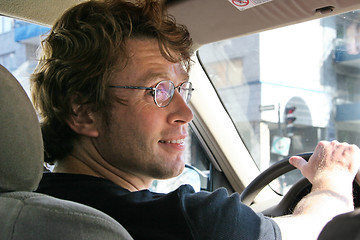 Image showing Young man driving