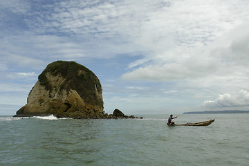 Image showing the latin man in boat on pacific