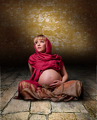 Image showing Woman in free clothes in the lotus position