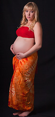 Image showing art portrait of pregnant woman on a black background