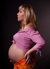 Image showing art portrait of pregnant woman on a black background