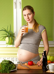 Image showing Pregnant Woman on Kitchen