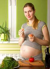 Image showing Pregnant Woman On Kitchen