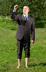 Image showing Businessman Writing Something Outdoors