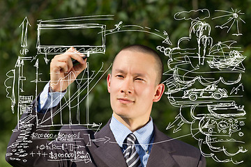 Image showing Businessman Writing Something Outdoors