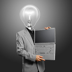 Image showing Lamp Head Businessman with Laptop