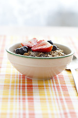 Image showing Bowl of muesli and berries