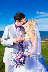 Image showing  happy groom and bride on a sea coast