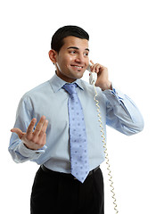 Image showing Businessman in discussion on telephone