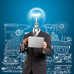 Image showing Lamp Head Businessman With Touch Pad